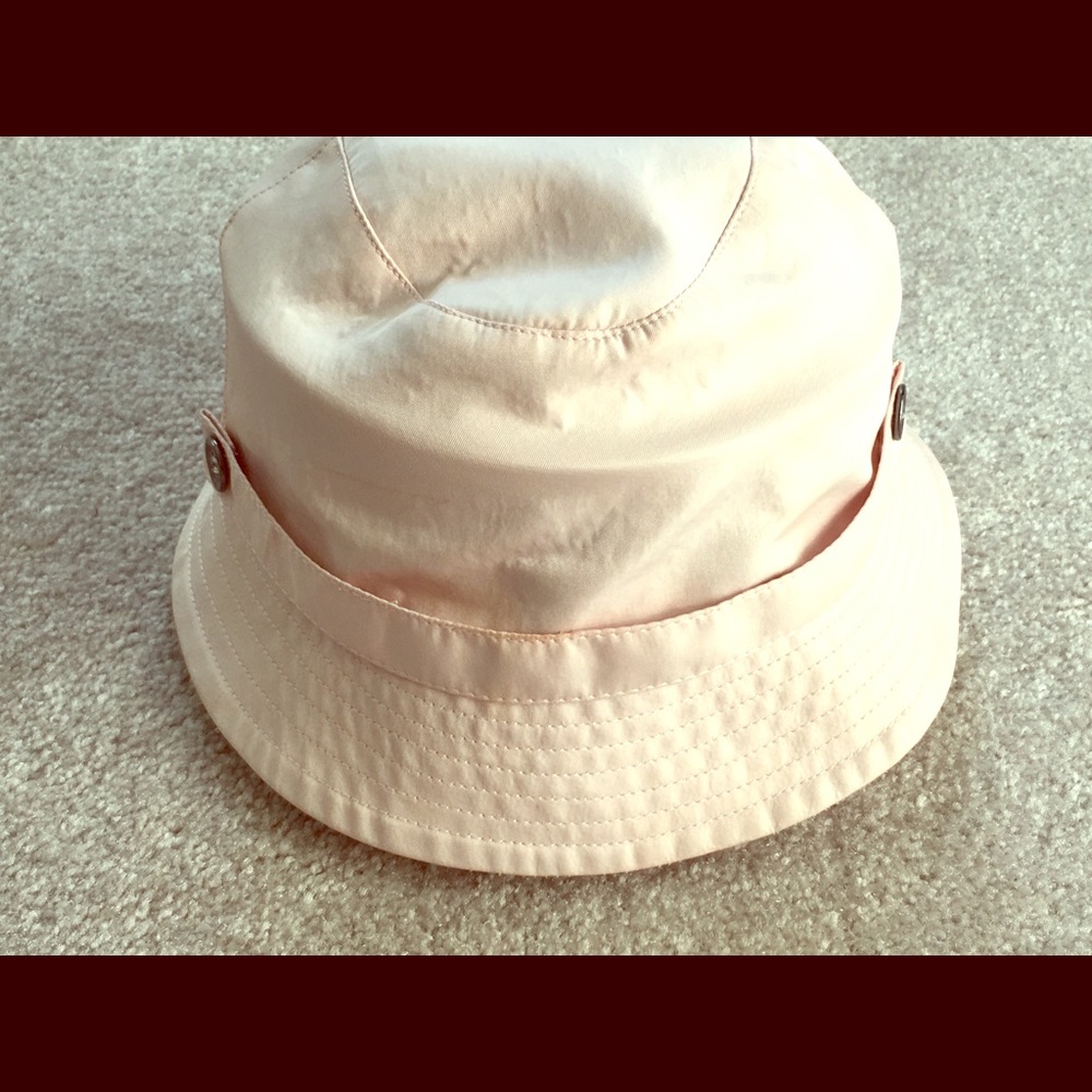Burberry medium sized light pink bucket hat.